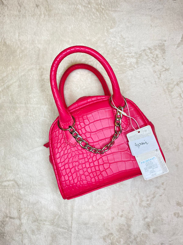 Pink cross body bag