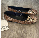 Gold sequine flat pumps