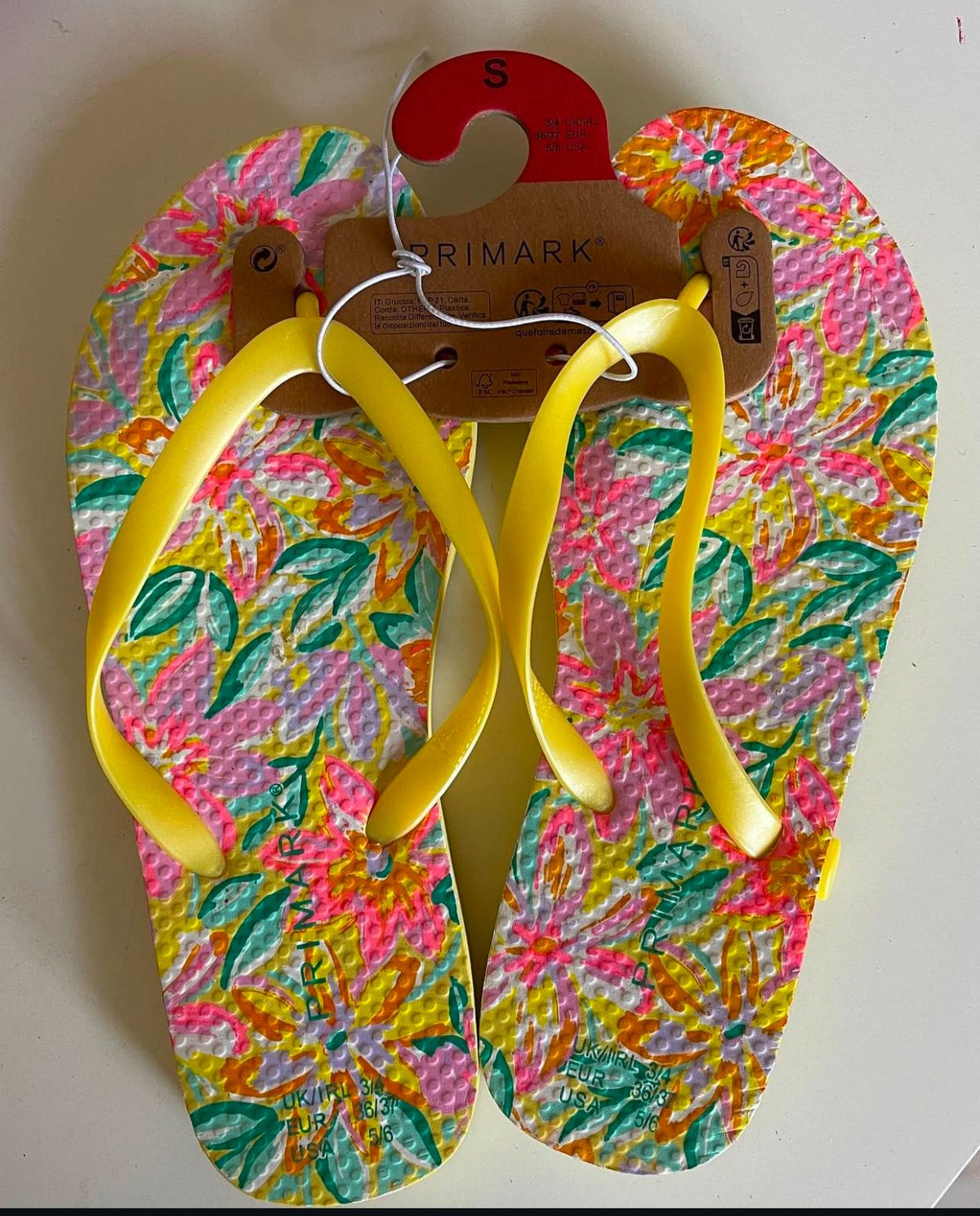 Yellow floral flip flop